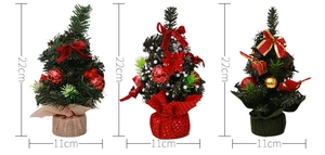 Three 20cm mini Christmas trees with burlap, red, and green bases featuring festive ornaments