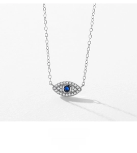 Detailed close-up of S925 sterling silver evil eye pendant with blue and white zircons