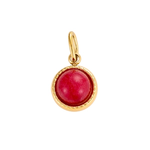 Close-up of golden stainless steel round pendant with vibrant red gemstone inlay