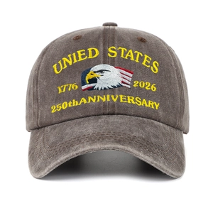 Close-up of eagle embroidery on a vintage washed brown 250th anniversary baseball cap