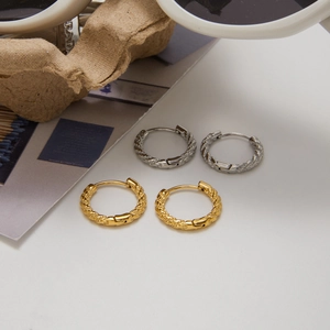 Classic 14K gold and silver plated hammered hoop earrings with textured finish
