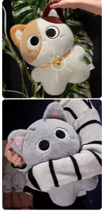 Close-up of plush cat toy featuring detailed embroidery eyes and a cute bell collar