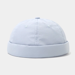 Detail of light blue quick-dry docker hat with breathable eyelets and top button