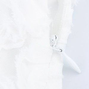 Elegant white sleeveless shirt dress with a waist belt and hidden zipper detail