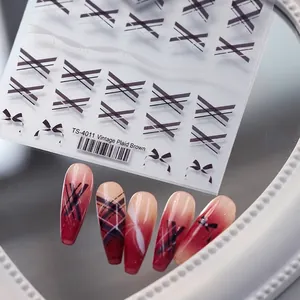 Japanese style TS-4011 vintage plaid and bow nail decals on gradient red nails