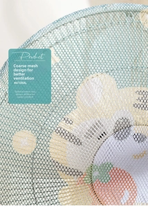 Macro detail of large mesh electric fan safety cover showing ventilation and fabric texture