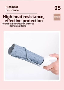 Heat-resistant grey silicone mat with wave texture wrapping a hair curling iron
