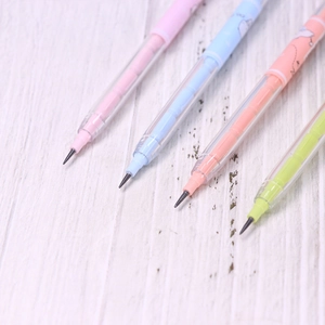 Close-up of four colorful non-sharpening pencils in pink, blue, orange and green colors