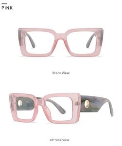 Detail view of pink transparent resin frame with marble-pattern temples and gold ring