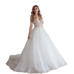 Elegant off-the-shoulder white wedding dress with lace embroidery and a long trailing skirt
