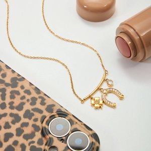 Gold stainless steel lucky necklace with clover, horseshoe pendants and white zircon