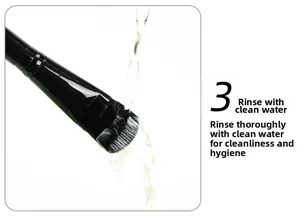 Detail showing the cleaning process of a flat mask brush with water flow on black bristles