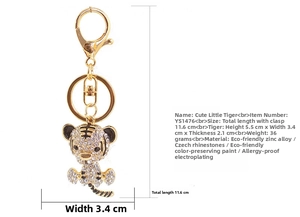 Detailed view of rhinestone tiger keychain with specific measurements 5.5x3.4cm shown