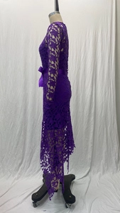 Detail of purple lace long sleeve dress with hollow crochet pattern and waist ribbon