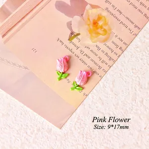Detailed view of pink tulip resin charms for DIY jewelry making, 9x17mm size flowers