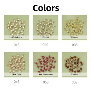 Detail of six DIY jewelry charms with zircon, artificial pearls and pink opal