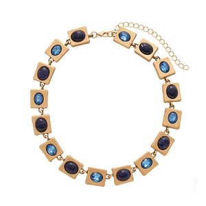 Retro gold geometric necklace featuring square links with blue resin crystal inlay