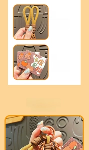 Close-up of cute Capybara woven keychain with brown yellow braided cord and metal clasp