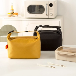 Insulated waterproof lunch bag with roll-top closure for work in yellow and black