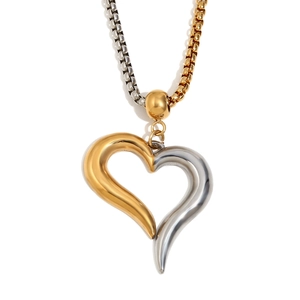 Two-tone gold and silver heart pendant necklace with square pearl chain on white background