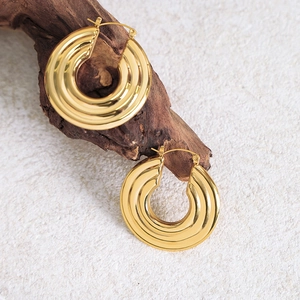 Elegant gold-plated titanium steel earrings with a triple-layered textured hoop design