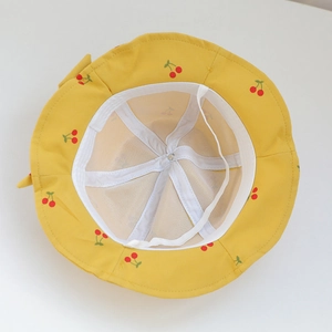 Cute yellow baby sun hat with cherry print and breathable mesh lining for toddlers