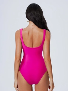 Elegant back view of hot pink one-piece swimsuit with a deep U-back design for women
