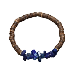 Bohemian coconut shell bracelet with natural blue stones and golden spacers