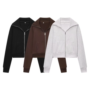 Three colors of women's zip-up fleece hoodies and pants sets in black, brown, and light grey