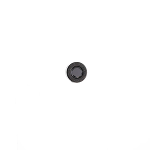 Close-up of black titanium steel stud earring with star relief and round zircon stone