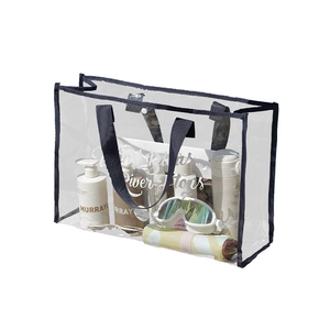 Transparent waterproof PVC beach bag with black handle and decorative cursive text design