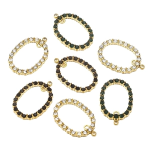 Oval stainless steel crystal pendants in gold with green, black and clear stones