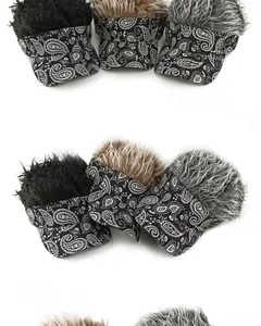 Detail view of ethnic paisley baseball caps with realistic wig hair in three colors