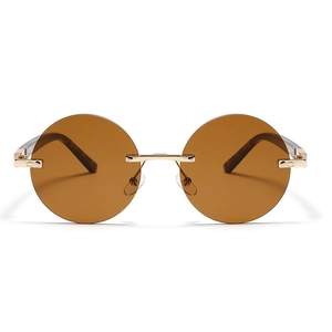 Retro randlose runde Sonnenbrille mit bernsteinfarbenen Gläsern und goldenem Metallsteg