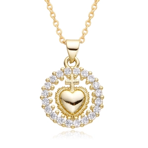 Gold heart pendant necklace with cross detail and zircon inlay on white background