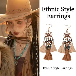 Bohemian ethnic earrings with wood beads, vintage metal flowers and cotton tassels