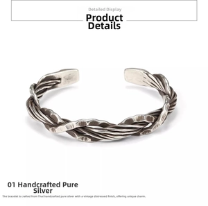Detail of vintage Thai silver twisted wire braid cuff with hand-hammered texture finish