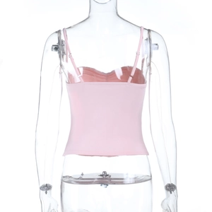 Detailed back view of pink slim-fit ribbed crop top featuring thin shoulder straps