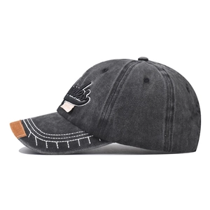 Vintage washed cotton baseball cap with side embroidery and brown suede brim edge detail