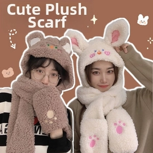 Close-up of 3-in-1 plush rabbit and bear ear hats with integrated scarves and gloves