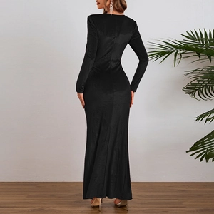 Rear view of an elegant black long-sleeve velvet evening dress with a slim fit silhouette