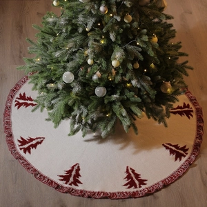 48-inch knitted Christmas tree skirt with red cedar pattern and decorative fringe