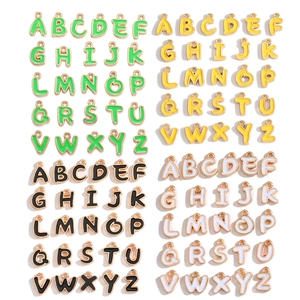 DIY colorful A-Z alphabet charms in white, yellow, green, and black enamel finish
