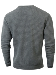 Detail view of the back of grey men's sweatshirt with checkered quilted texture