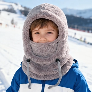Detail of grey plush balaclava hood with adjustable drawstring in outdoor snow setting