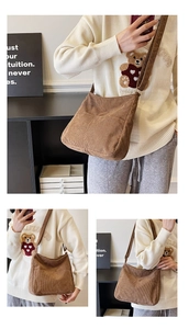 Detailed views of a brown corduroy bucket bag featuring an external patch pocket and strap