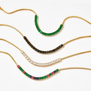 Gold box chain necklaces with emerald, black, white, and multicolor rectangular zircons
