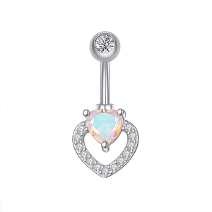 Detailed view of silver heart navel ring with opal stone and micro-pave crystals