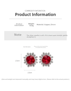 Detail view of vintage sunburst earrings featuring a square red zircon and silver needle