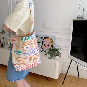 Striped canvas tote bag with colorful stripes and corduroy texture for daily casual wear